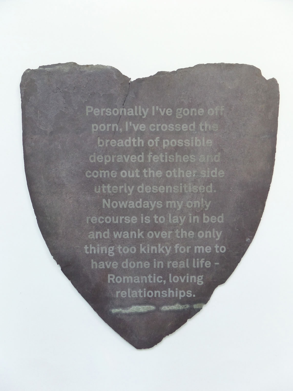 'Romance' - Laser engraved text from internet on found slate, 2014